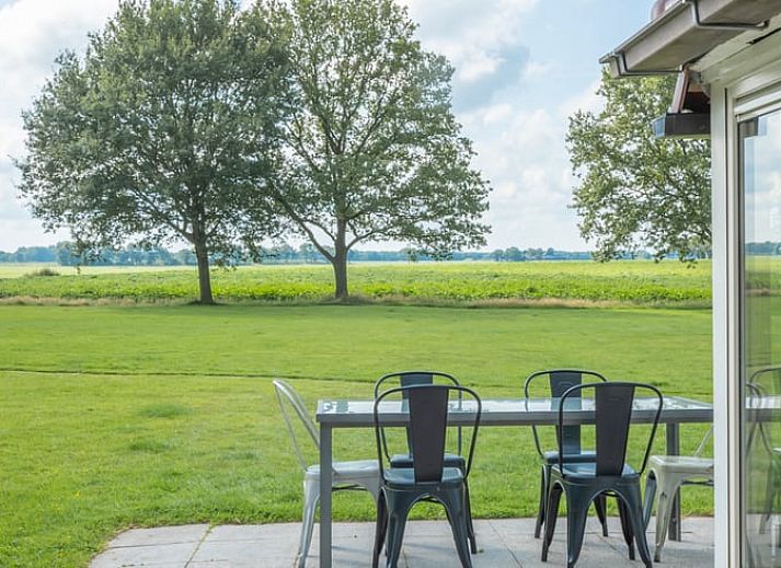 Aerial view of Holiday home in Haule, surrounded by lush nature in Friesland.