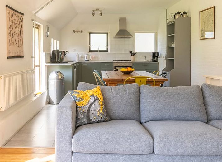 Spacious garden at cottage in Haule, with solar panels and surrounded by Frisian forests.
