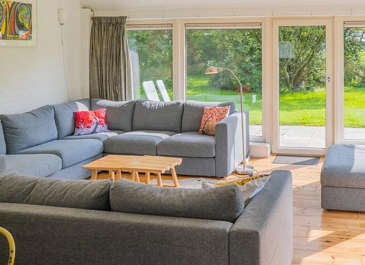 Spacious garden at cottage in Haule, with solar panels and surrounded by Frisian forests.