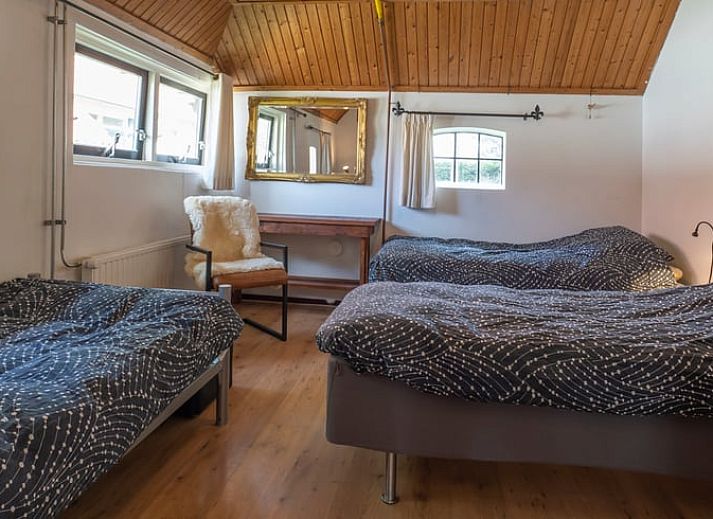 Spacious garden at cottage in Haule, with solar panels and surrounded by Frisian forests.