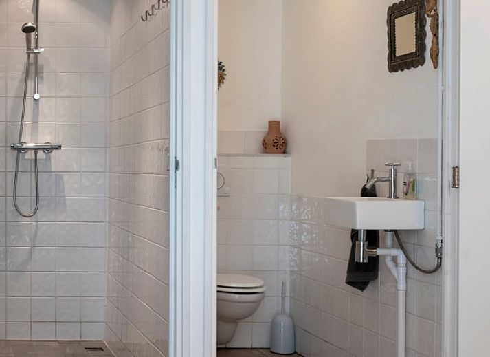 Sunny veranda of cottage in Haule, ideal for relaxation in Friesland.