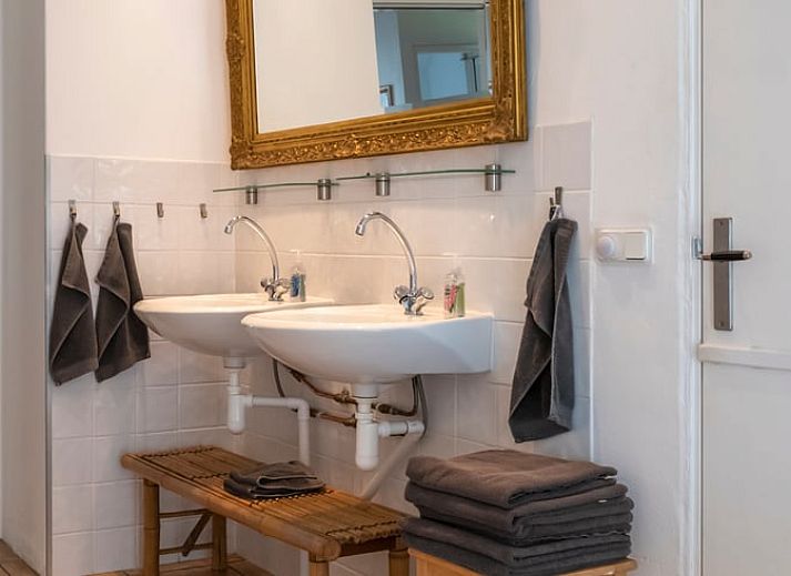 Sunny veranda of cottage in Haule, ideal for relaxation in Friesland.