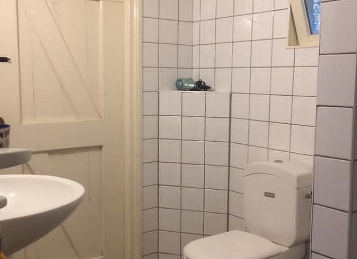 Cozy porch of Huisje in Haule, vacation home in Friesland.