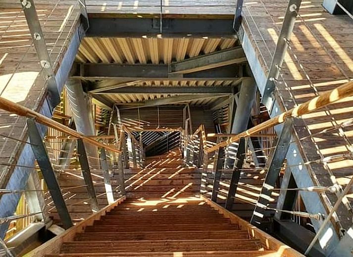 Ferienhaus in Oosterwolde, in den friesischen Waeldern von Friesland gelegen, mit Veranda und gruener Umgebung.