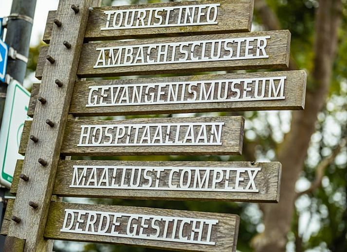 Attractive bedroom in a vacation home in Oosterwolde, Friesland, with modern artwork and comfortable furnishings in the Frisian forests.