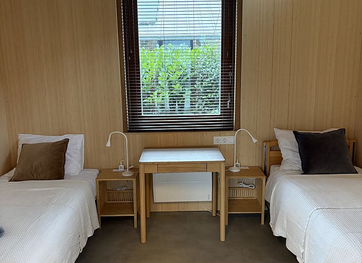 Relax in the comfortable indoor space of vacation home FR527 in Boijl, Friesland, overlooking the serene Frisian forests.