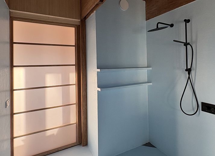 Relax in the comfortable indoor space of vacation home FR527 in Boijl, Friesland, overlooking the serene Frisian forests.