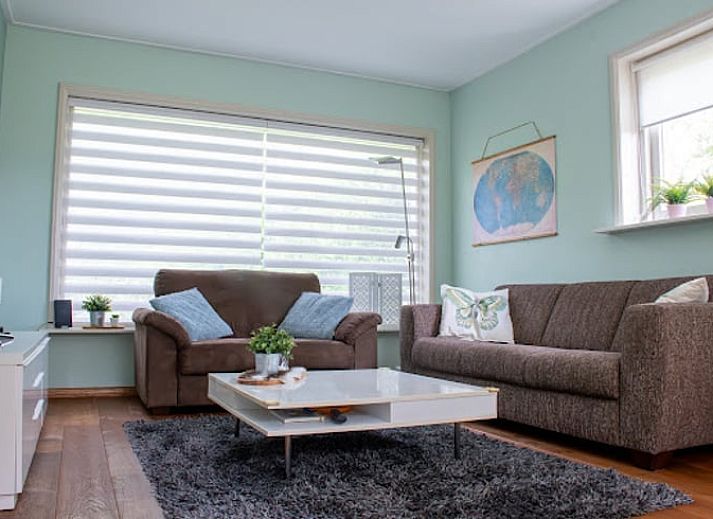 Rustieke charme van Vakantiehuisje in Hoornsterzwaag, gelegen in de Friese bossen.