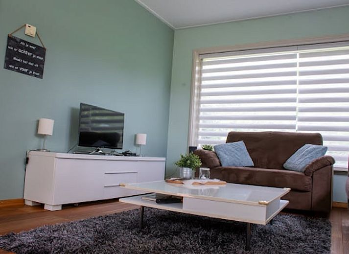 Rustieke charme van Vakantiehuisje in Hoornsterzwaag, gelegen in de Friese bossen.