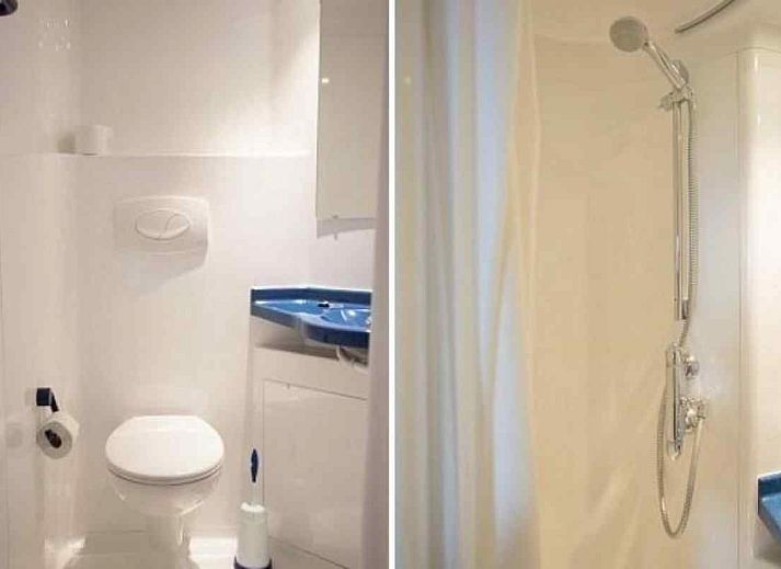 Ferienhaus FR108 in Oudehorne, Friesland, mit grossem gruenen Garten und traditioneller Architektur.