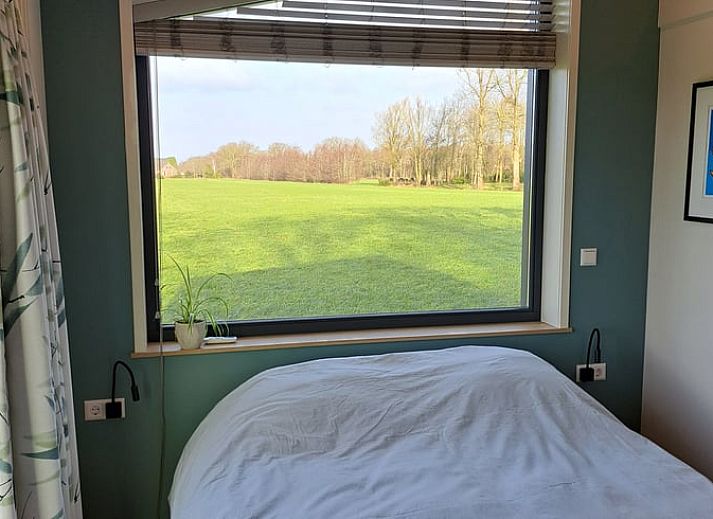 Vacation cottage in Lippenhuizen surrounded by lush nature in the Frisian woods, Friesland.