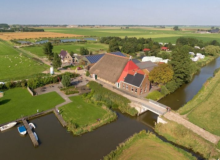 Bedroom with pool table in vacation home at Recreation Company de Blikvaart, Sint Annaparochie, unique accommodation in Friesland.
