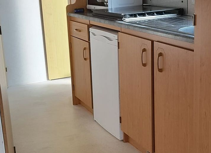 Rustig uitzicht op het platteland vanaf Vakantiehuisje in Sneek, ideaal voor een ontspannen verblijf.