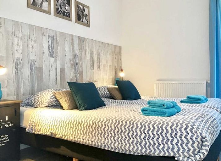 Terras van Vakantiehuis in Stavoren met uitzicht op groene omgeving, Friese elfsteden, Friesland.