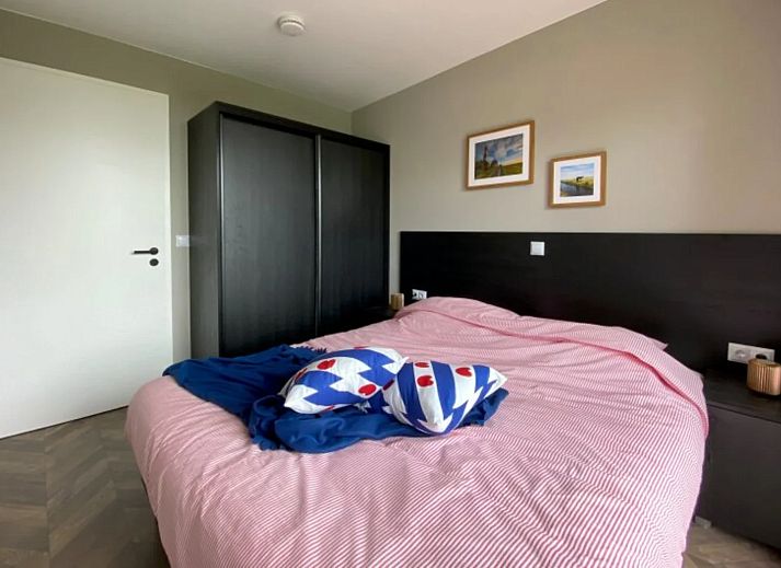Stylish living room in the detached house in Hindeloopen, Friesland, with modern interior and views of green surroundings.