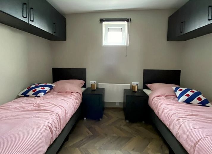 Stylish living room in the detached house in Hindeloopen, Friesland, with modern interior and views of green surroundings.