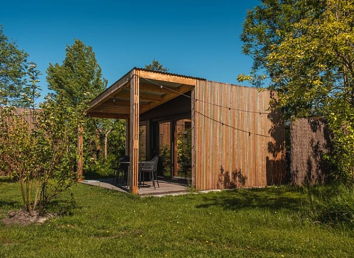 Vacation home in Scherpenzeel with charming terrace in the Frisian countryside, Friesland.