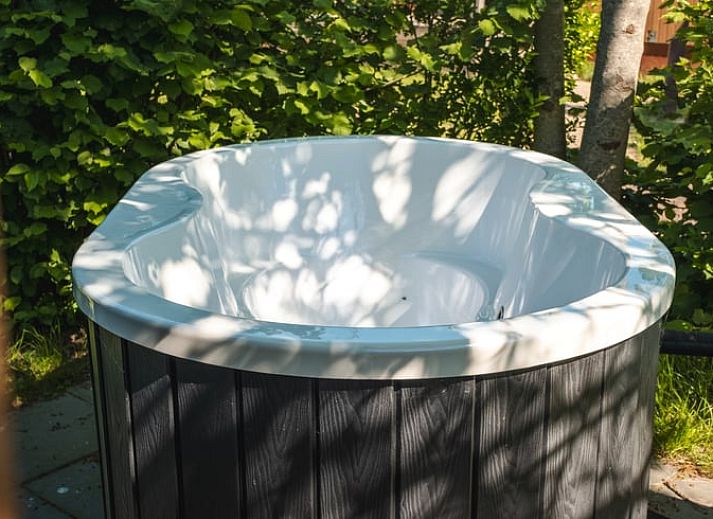 Rustic veranda at Holiday home in Scherpenzeel, surrounded by nature in Friesland.