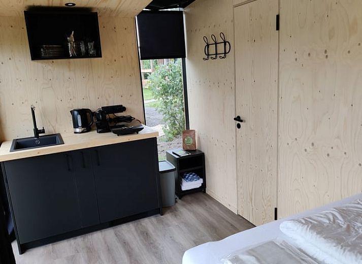 Rustic veranda at Holiday home in Scherpenzeel, surrounded by nature in Friesland.