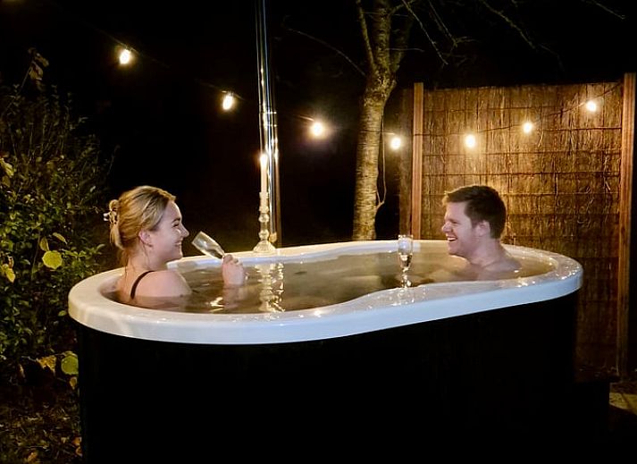 Rustic veranda at Holiday home in Scherpenzeel, surrounded by nature in Friesland.