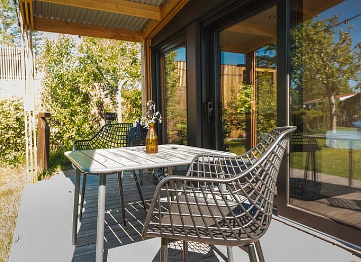 Rustic veranda at Holiday home in Scherpenzeel, surrounded by nature in Friesland.
