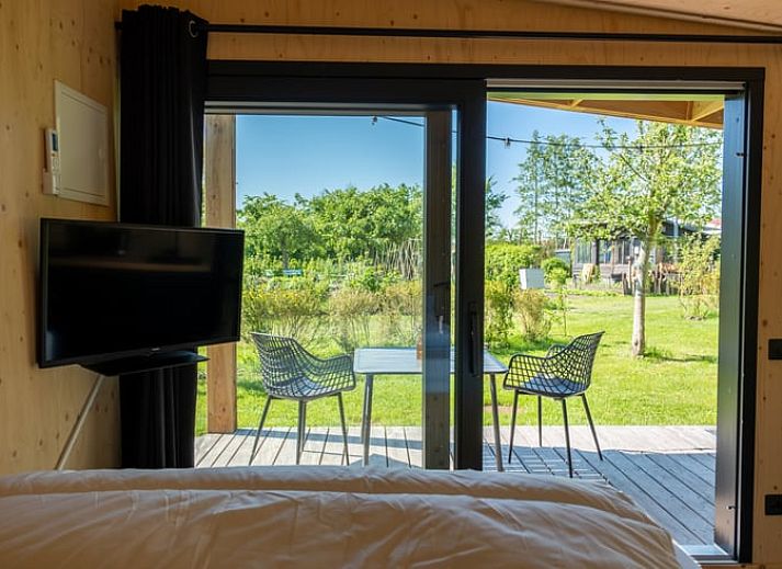 Private hot tub at Holiday home in Scherpenzeel, ideal for relaxation in Friesland.