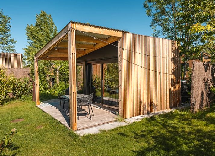 Private hot tub at Holiday home in Scherpenzeel, ideal for relaxation in Friesland.