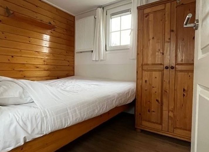 Rustiek Vakantiehuisje in Poppenwier aan het water in het Friese platteland, Friesland.