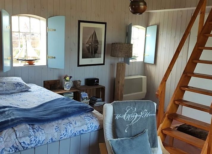 Historische sfeer bij Huisje in Driezum, vakantiehuis in Friesland, met een oude foto van de omgeving.