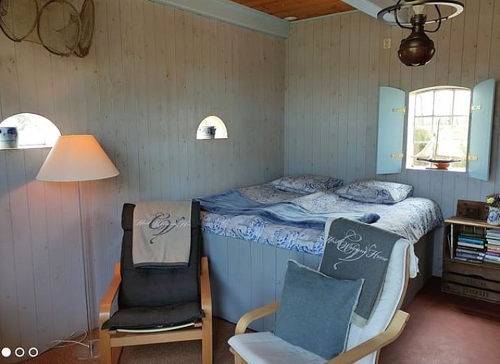 Historische sfeer bij Huisje in Driezum, vakantiehuis in Friesland, met een oude foto van de omgeving.