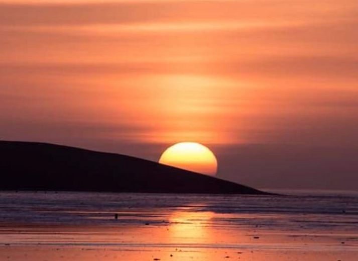 Cottage in Paesens, cozy sitting area with wood stove in Friesland.