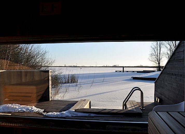 Prachtige zonsondergang bij Vakantiehuisje in Westhem, gelegen in het Friese platteland, Friesland.