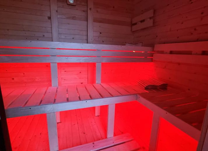 Authentic dining area in Holiday home in Bantega, Friesland, with rustic wooden furniture.