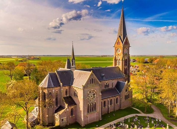 Eetruimte van Huisje in Greonterp met uitzicht op terras, Friesland.