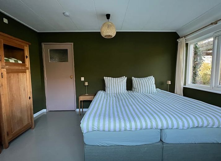 Serene pond landscape at Holiday home in Oldeholtpade, a peaceful spot in the Frisian countryside in Friesland.