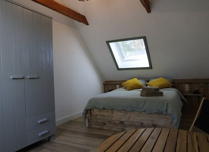 Gemuetliches Wohnzimmer in Cottage in Wijnaldum, Ferienhaus in der friesischen Landschaft.