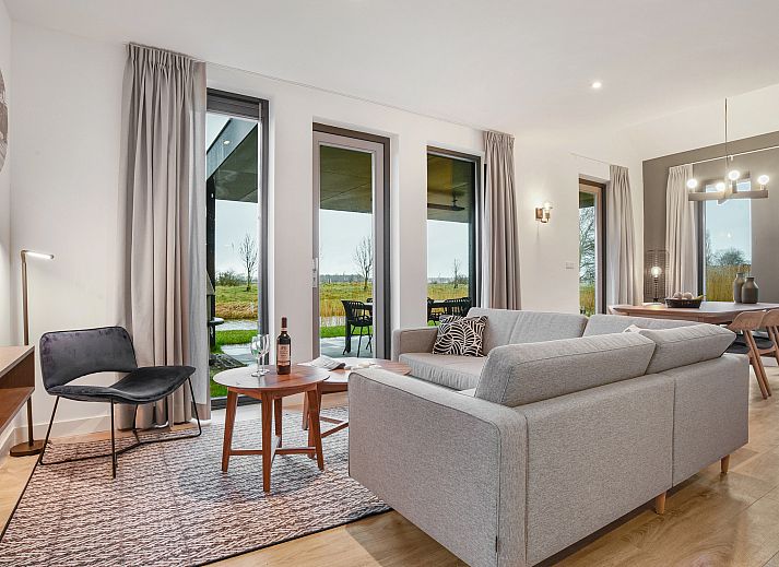 6-persoons woning 6C in Witmarsum, Friesland, met houten gevel op het Friese platteland.