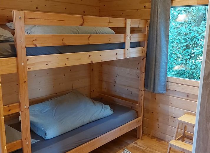 Entrance to Cottage in Munnekeburen with cozy porch and chairs.