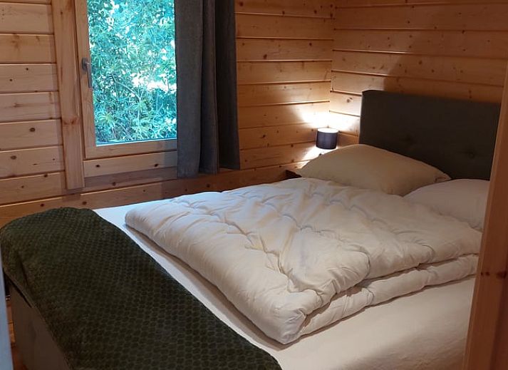 Entrance to Cottage in Munnekeburen with cozy porch and chairs.