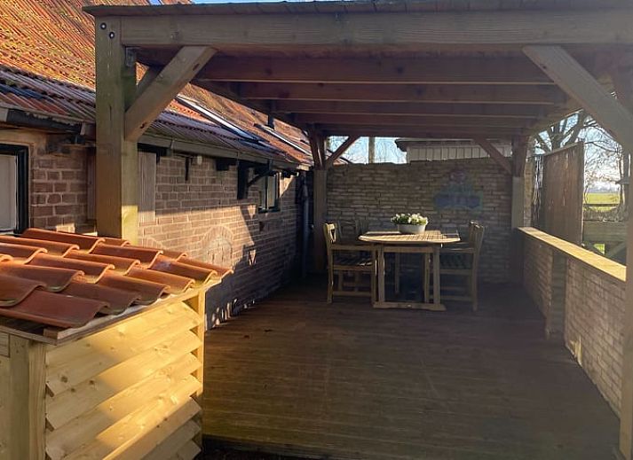 Comfortabele zitruimte in Huisje in Loenga met uitzicht op het Friese platteland.