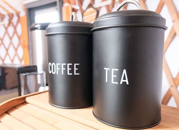 Rustieke vuurplaats bij Vakantiehuisje in Feanwalden, Friesland omgeven door groene natuur.