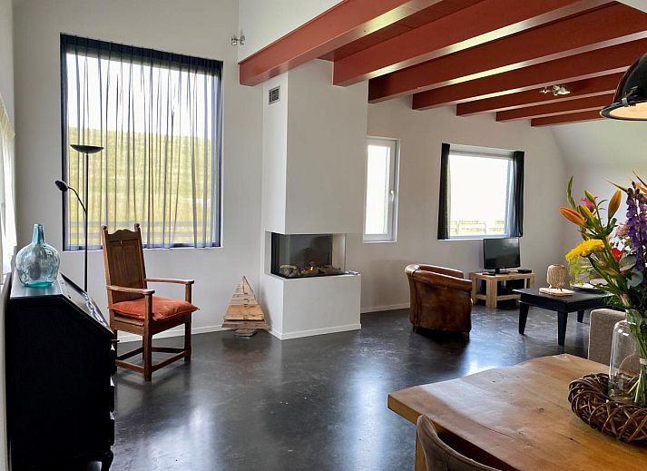 Ferienhaus Huske 2 in Tzummarum, Friesland mit Blick auf die friesische Landschaft.