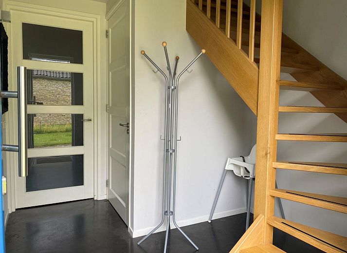 Gemuetliches Wohnzimmer im Ferienhaus Huske 2, Tzummarum, Friesland mit Kamin.