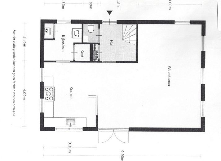 Geraeumiges Esszimmer im Ferienhaus Bargereed 4 Tzummarum, Tzummarum mit Blick auf den Garten in Friesland.
