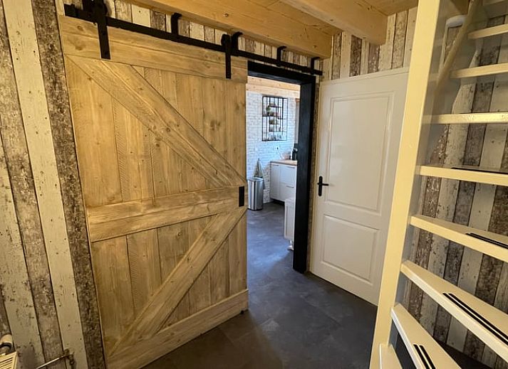 Vakantiehuisje in Peins met prachtig uitzicht op het Friese platteland, ideaal voor ontspanning.