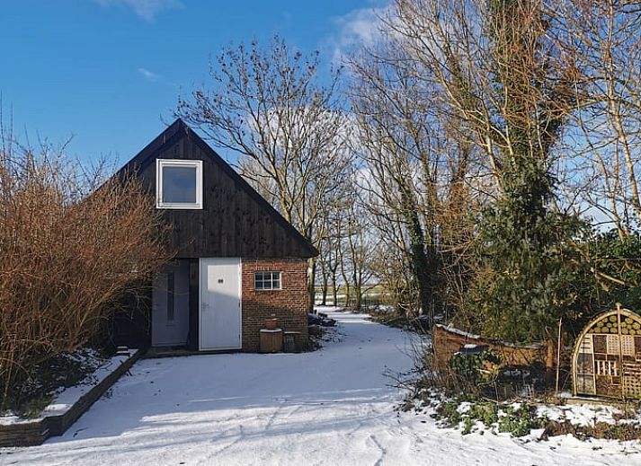Stijlvolle binnenruimte van Huisje in Bornwird, vakantiehuis in Friesland.