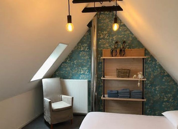 Rustieke vakantiewoning in Bartlehiem met aanlegsteiger en boot, gelegen in Friesland.