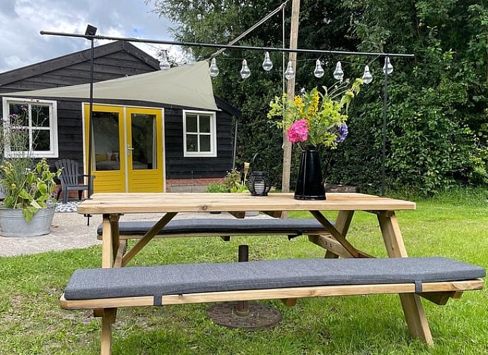 Bright and spacious interior of Holiday home in De Tike, perfect for relaxation in Friesland.