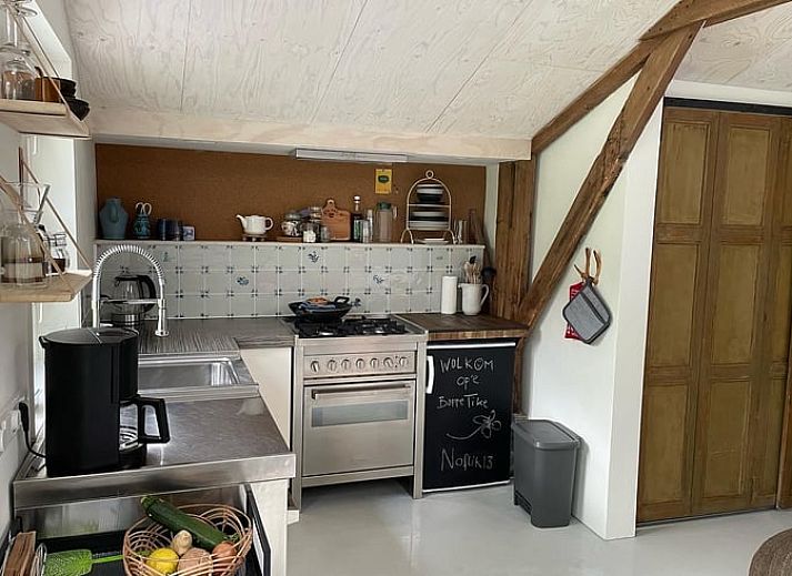 Bright and spacious interior of Holiday home in De Tike, perfect for relaxation in Friesland.