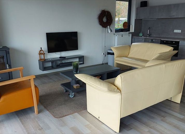 Enjoy the waterfront terrace at Cottage in Jannum near Dokkum in the Frisian countryside in Friesland.